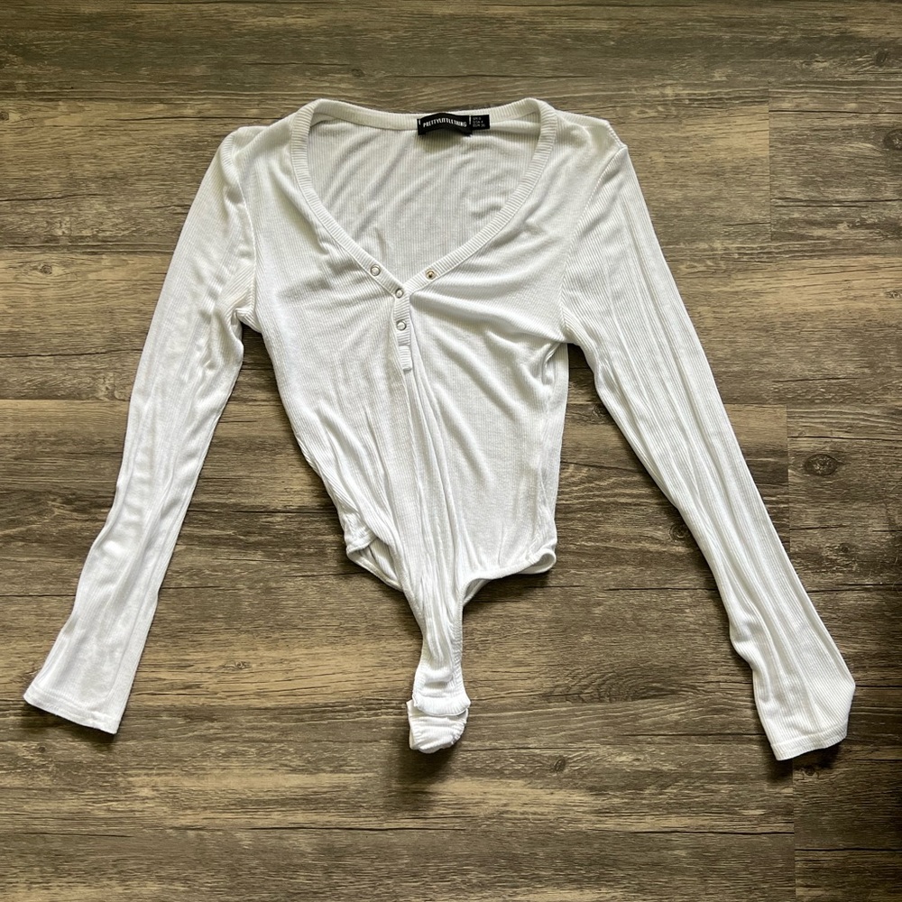 PRETTY LITTLE THING white button up body suit with thong strap
